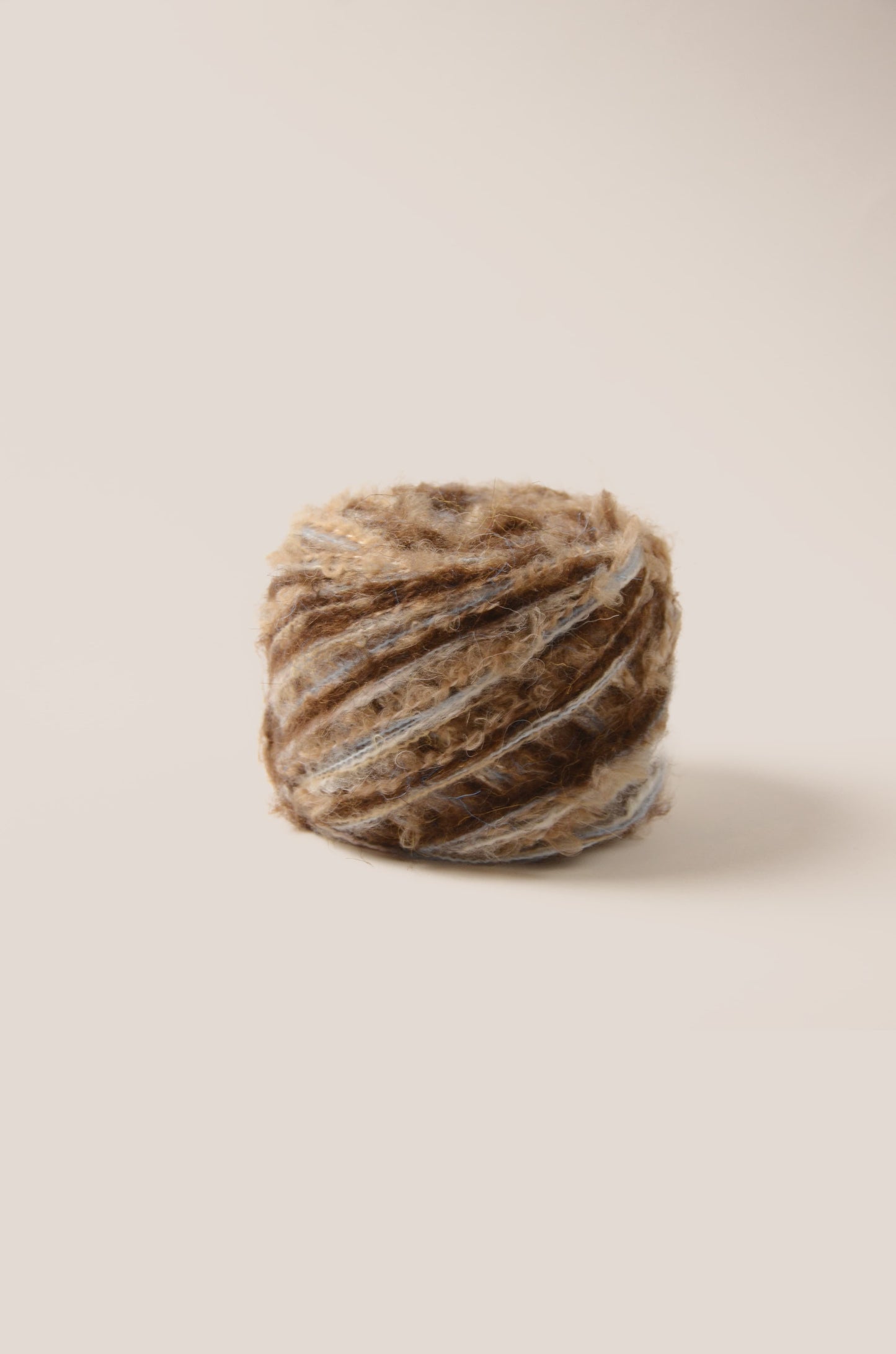 Morocco hand-blended yarn – deep and light brown tones with subtle blue highlights, smooth soft texture inspired by natural stone and earth colours